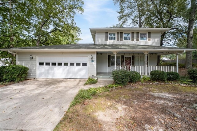 view of front of home with a porch and a garage