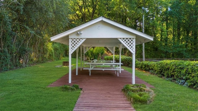 view of home's community featuring a gazebo, a deck, and a yard