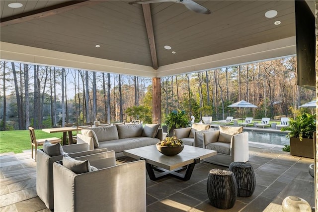 view of patio / terrace featuring outdoor lounge area, an outdoor pool, and ceiling fan