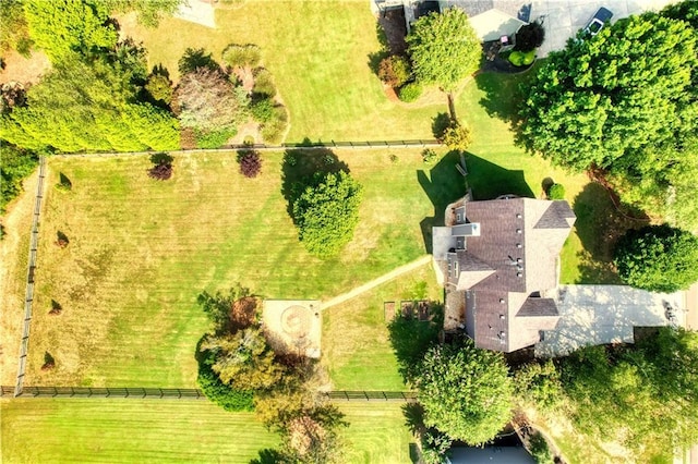 birds eye view of property featuring a rural view