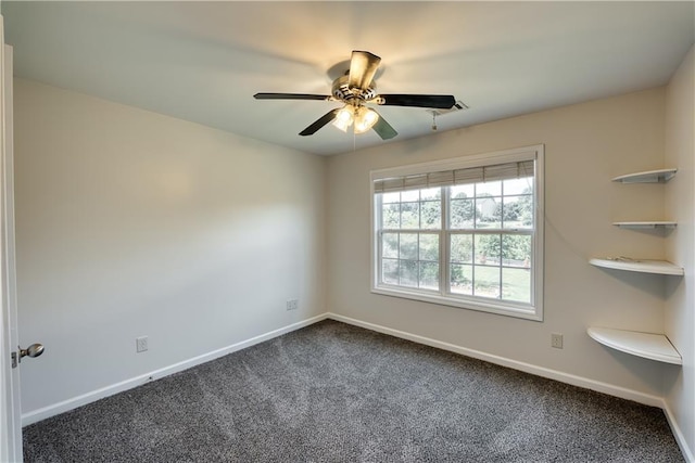 unfurnished room featuring ceiling fan and carpet floors