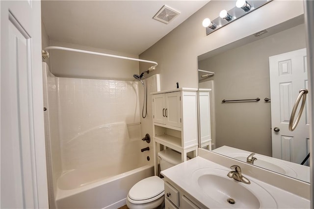 full bathroom featuring vanity, toilet, and  shower combination