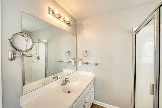 bathroom with vanity and walk in shower