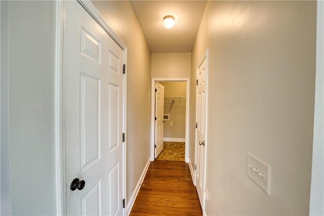 hall featuring dark hardwood / wood-style floors