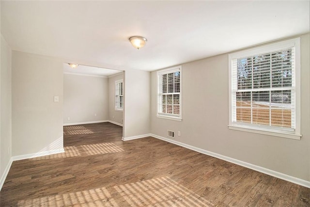 empty room featuring hardwood / wood-style flooring