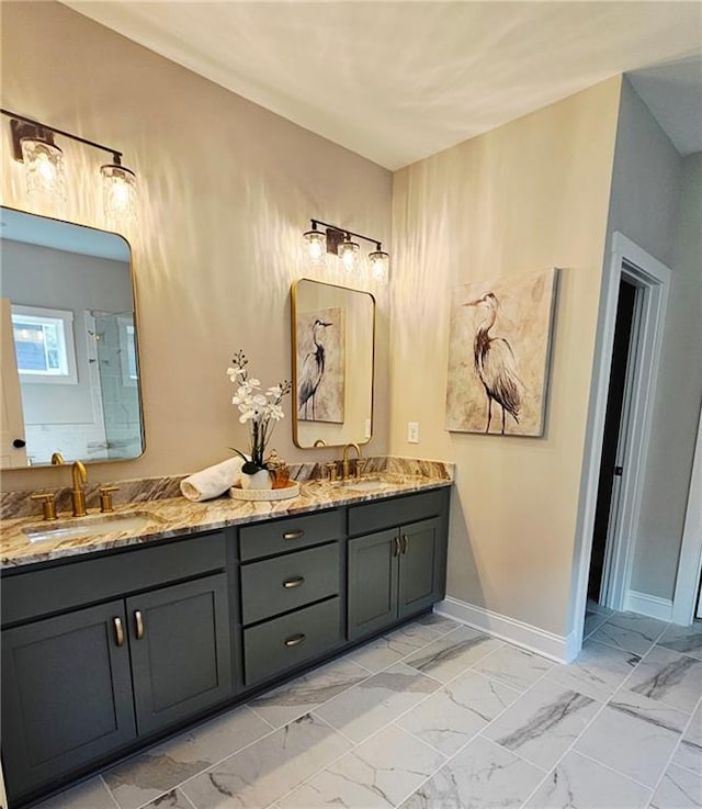 101 Red Oak Ln, Carrollton, GA 30116 - bathroom featuring marble finish flooring, double vanity, and baseboards