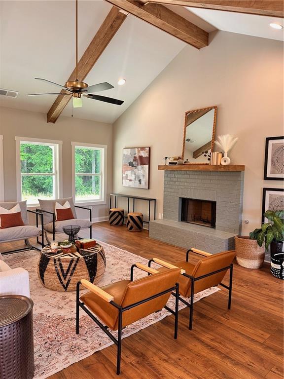 101 Red Oak Ln, Carrollton, GA 30116 - living area with wood finished floors, a fireplace, a ceiling fan, recessed lighting, and baseboards