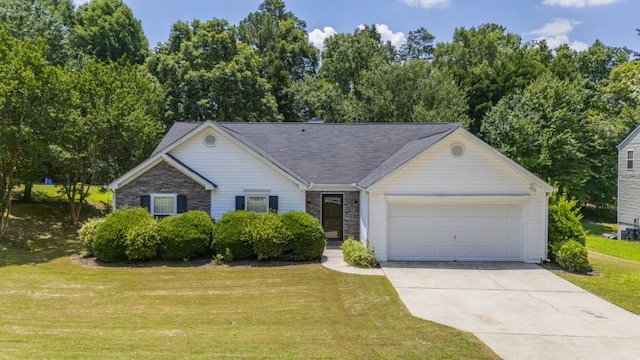 706 Hillmont Dr, Loganville, GA 30052 - ranch-style home with a garage, driveway, and a front lawn