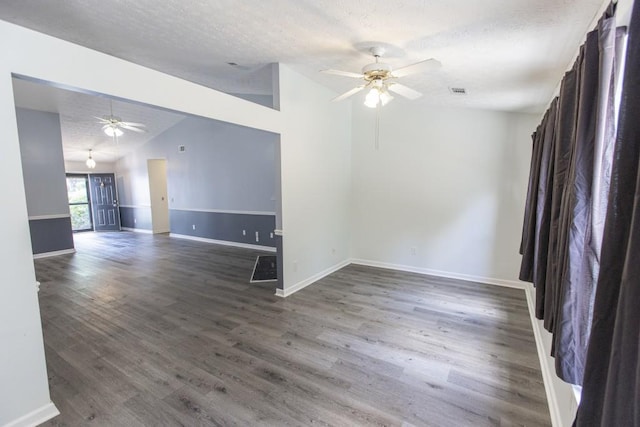 706 Hillmont Dr, Loganville, GA 30052 - unfurnished room featuring ceiling fan, a textured ceiling, wood finished floors, and vaulted ceiling