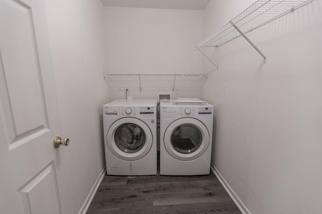 706 Hillmont Dr, Loganville, GA 30052 - washroom featuring washer and dryer and wood finished floors