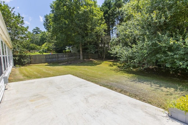 706 Hillmont Dr, Loganville, GA 30052 - fenced backyard featuring a patio area
