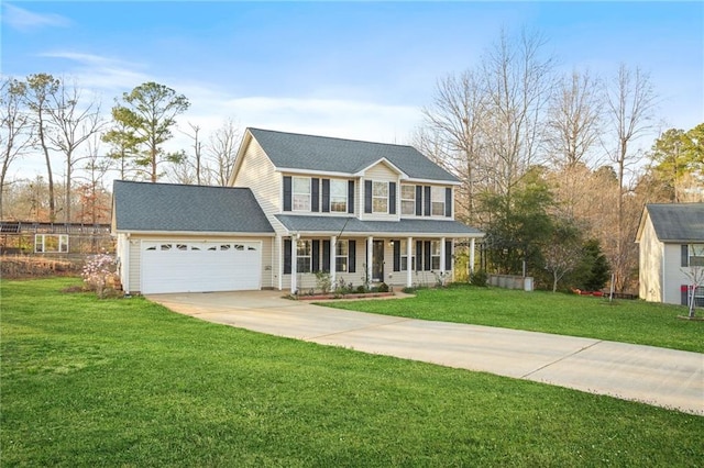 colonial home with a front yard, covered porch, concrete driveway, and an attached garage