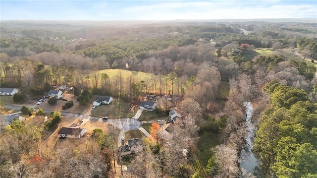 drone / aerial view with a forest view