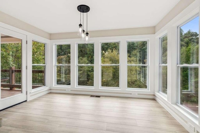 view of unfurnished sunroom