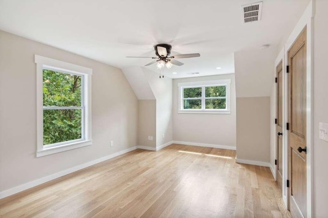 bonus room featuring vaulted ceiling, ceiling fan, and light wood-type flooring