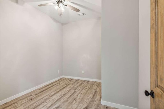 spare room with ceiling fan and light hardwood / wood-style flooring