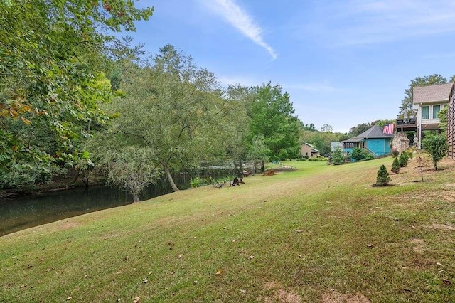 view of yard with a water view