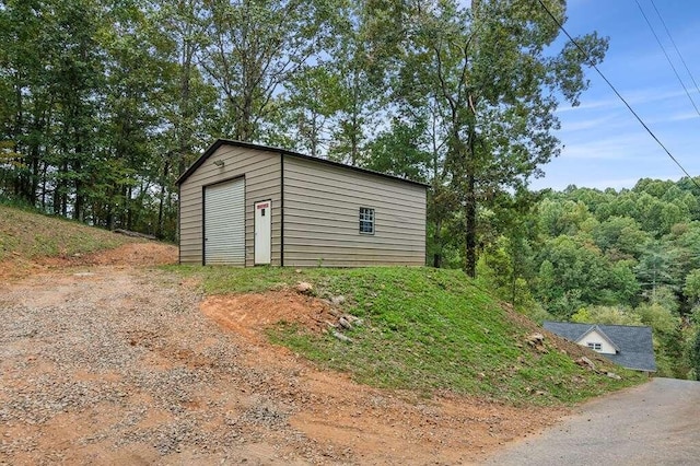 view of outdoor structure featuring a garage