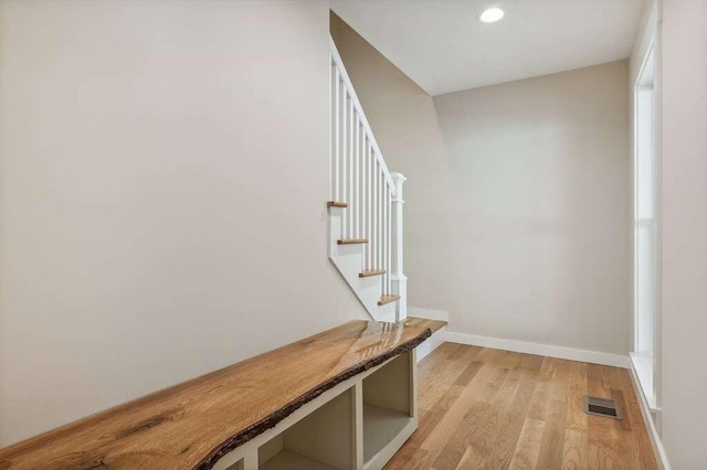 interior space with hardwood / wood-style flooring