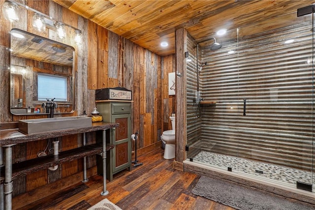 bathroom with hardwood / wood-style floors, wood walls, wooden ceiling, toilet, and walk in shower