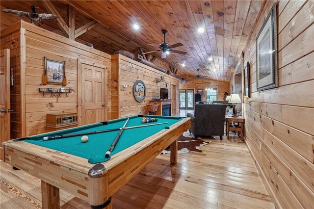 playroom with ceiling fan, billiards, wooden walls, and vaulted ceiling