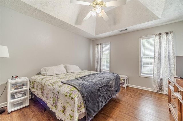 901 Elijah Way, Bethlehem, GA 30620 - bedroom with wood finished floors, baseboards, a textured ceiling, and ceiling fan