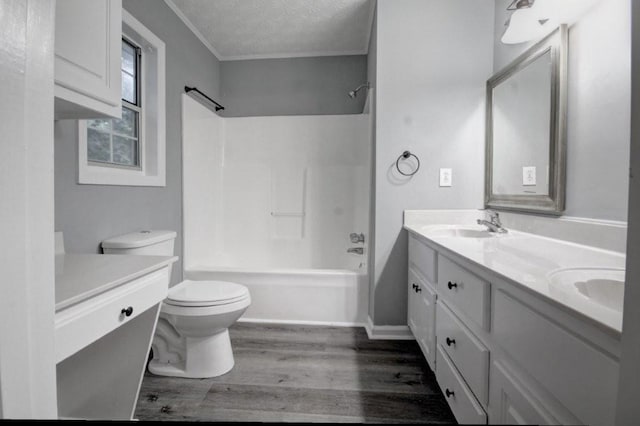 2773 Hawk Trace Ct NE, Marietta, GA 30066 - bathroom with double vanity, wood finished floors, a textured ceiling, shower / tub combination, and ornamental molding