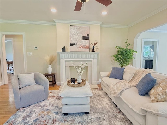 2437 N Decatur Rd, Decatur, GA 30033 - living area featuring a fireplace, wood finished floors, crown molding, a ceiling fan, and recessed lighting