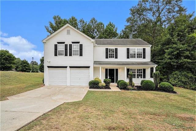 front facade with a front lawn, covered porch, and a garage