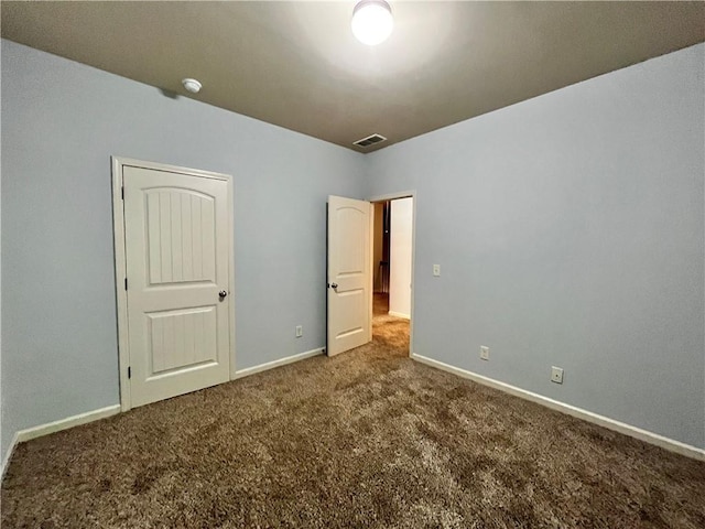 unfurnished bedroom featuring carpet flooring