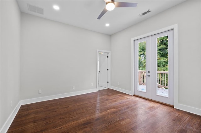 unfurnished room with ceiling fan, french doors, and dark wood-type flooring