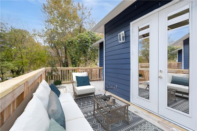 deck with an outdoor hangout area and french doors