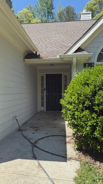 3510 Hog Mountain Rd, Dacula, GA 30019 - entrance to property with roof with shingles and a chimney