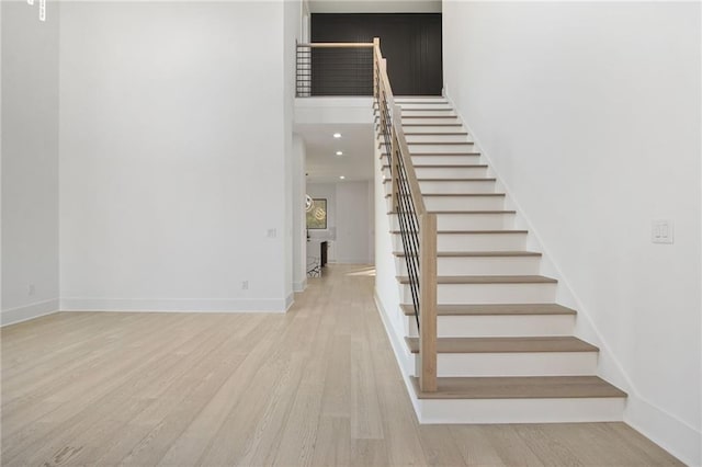 stairway with wood-type flooring