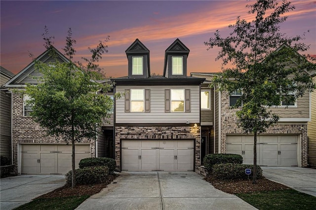 2909 Emme Ct, Conyers, GA 30094 - view of front of home featuring concrete driveway and an attached garage