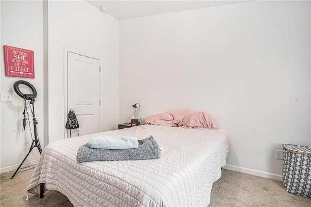 2909 Emme Ct, Conyers, GA 30094 - carpeted bedroom featuring baseboards