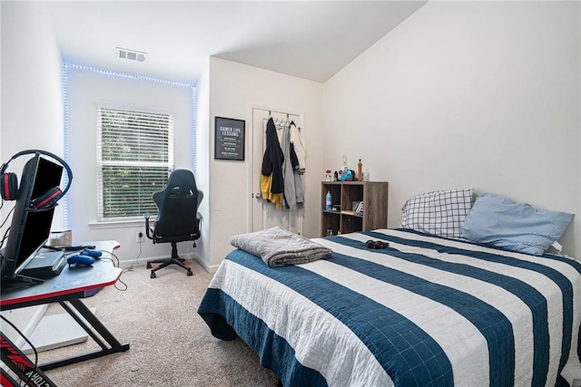 2909 Emme Ct, Conyers, GA 30094 - carpeted bedroom featuring baseboards, a desk, and a closet