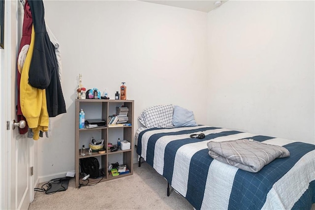 2909 Emme Ct, Conyers, GA 30094 - carpeted bedroom featuring baseboards