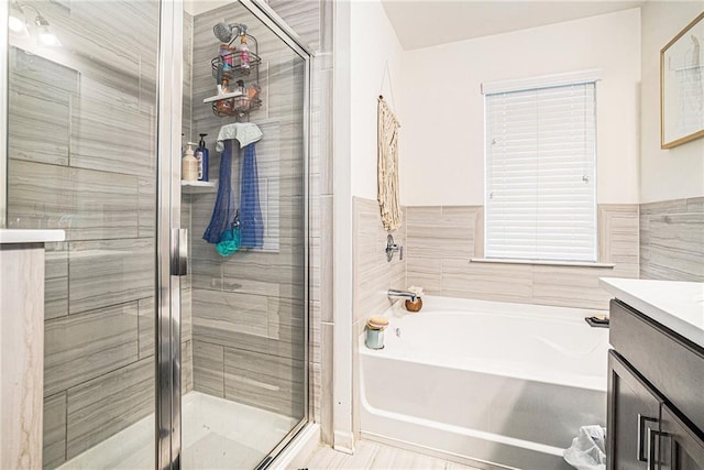 2909 Emme Ct, Conyers, GA 30094 - bathroom with a bath, a stall shower, and vanity