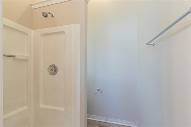 bathroom featuring walk in shower