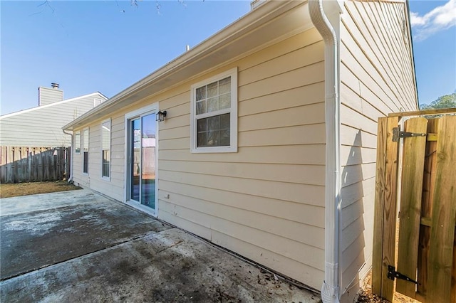 view of home's exterior with a patio area