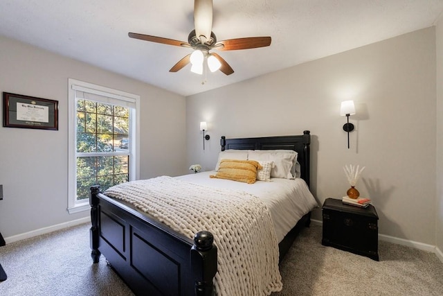 bedroom with ceiling fan and carpet