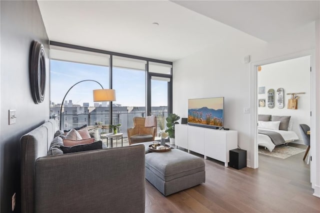 788 W Marietta St NW Unit 403, Atlanta, GA 30318 - living room with floor to ceiling windows and dark wood-style floors
