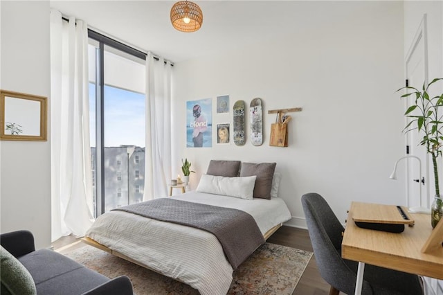 788 W Marietta St NW Unit 403, Atlanta, GA 30318 - bedroom featuring dark wood-style flooring