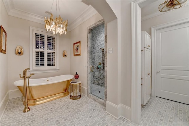 bathroom with crown molding, independent shower and bath, and a chandelier