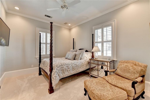 bedroom featuring crown molding, ceiling fan, and carpet flooring