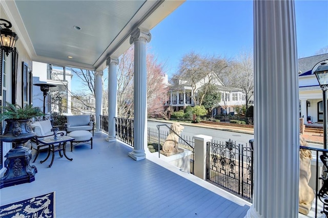 balcony featuring a porch