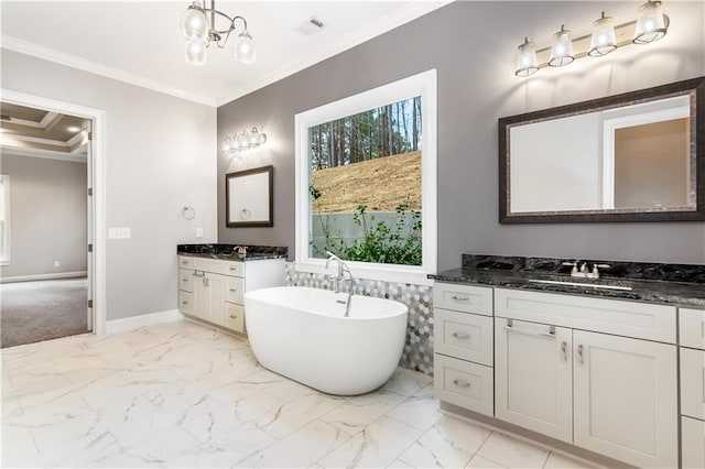 bathroom with vanity, an inviting chandelier, a bathtub, and crown molding