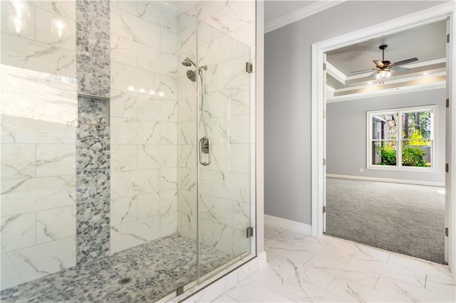 bathroom with walk in shower, ceiling fan, and ornamental molding