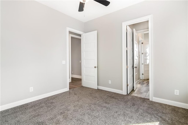 unfurnished bedroom featuring light colored carpet and ceiling fan